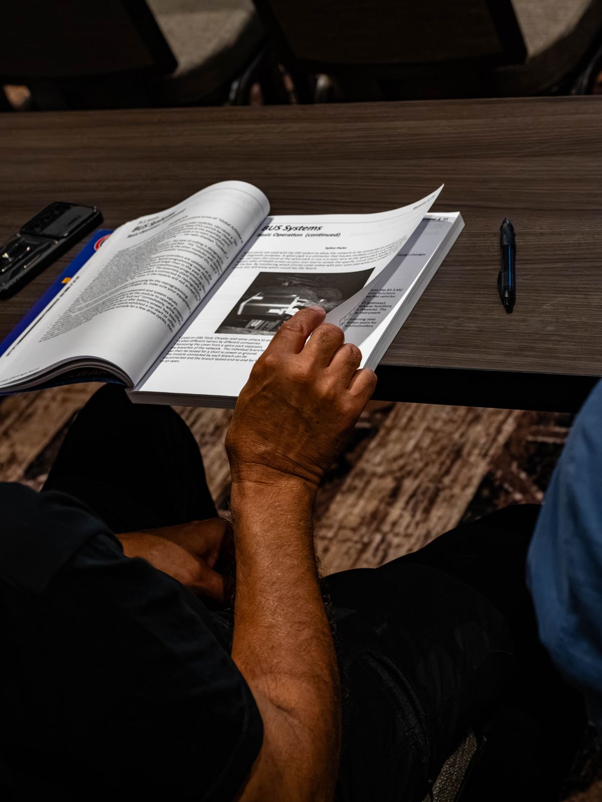 Seminar attendees and course materials at a previous Powertrain Expo