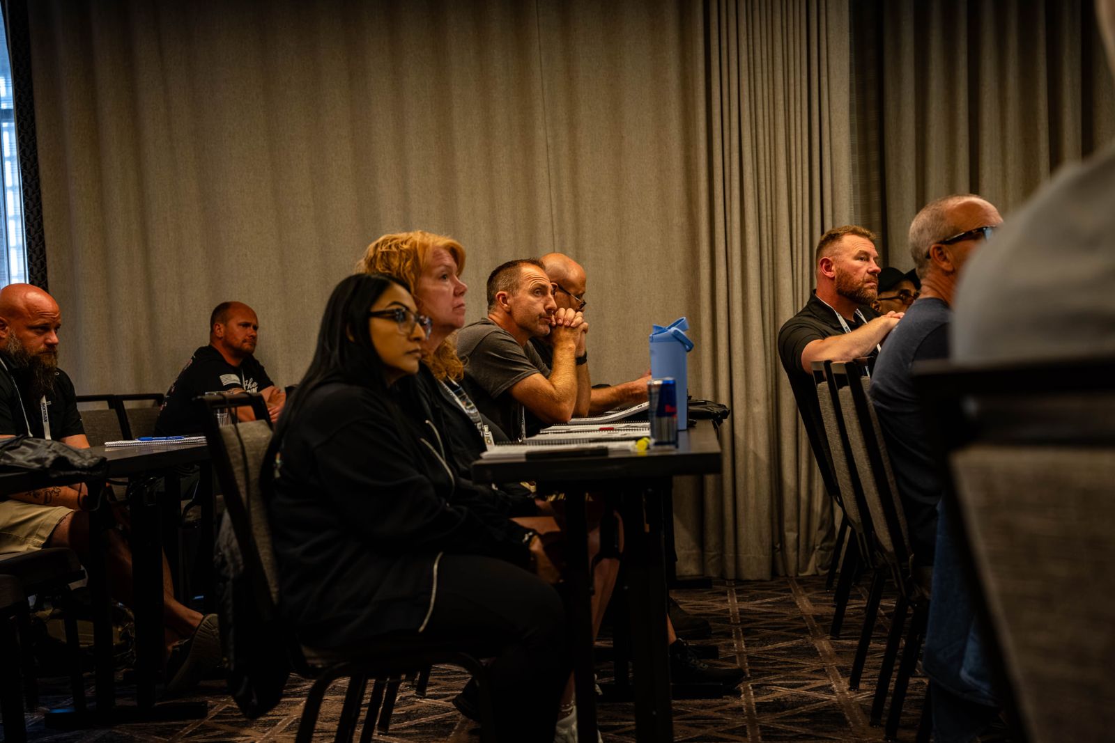 Seminar attendees and course materials at a previous Powertrain Expo